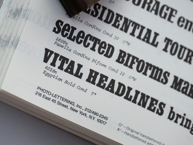 A close crop of the Photo-Lettering catalog, showing a line of type in the "Egyptian Bold Cond" style