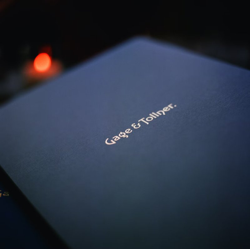 A menu with the logo "Gage & Tollner"