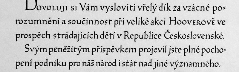 A paragraph of calligraphic text in Czech with diacritics